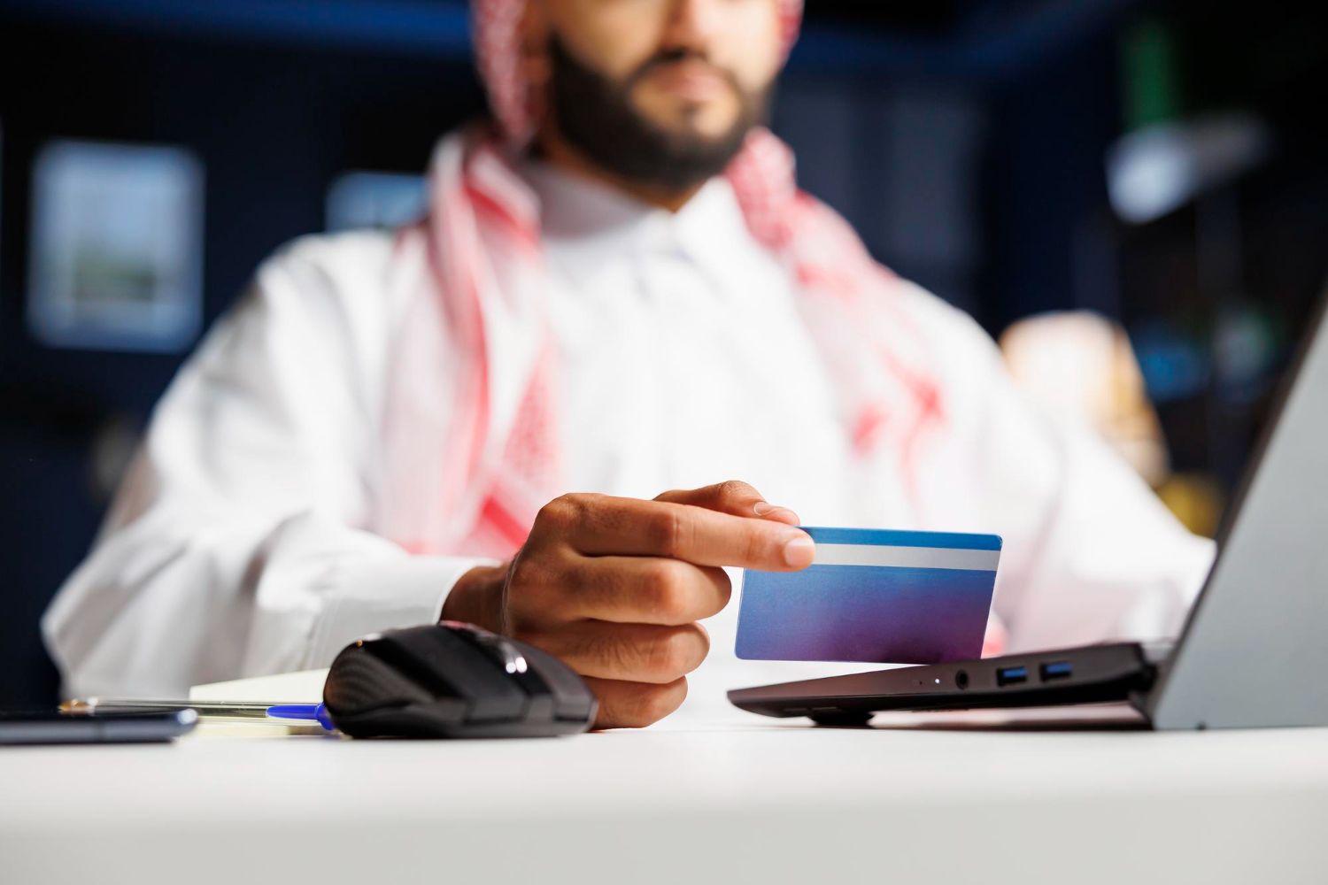 Person holding credit card